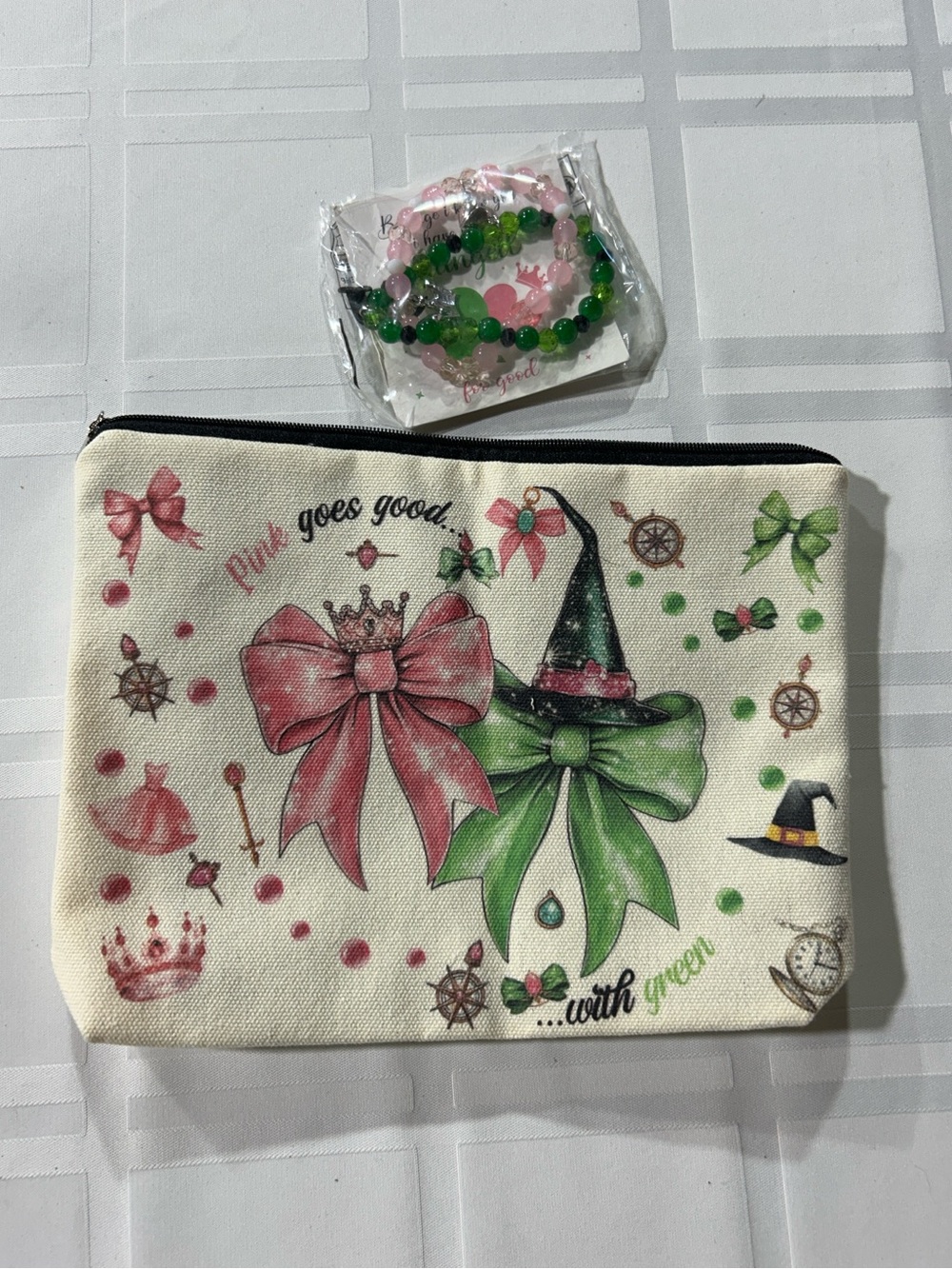 Kids Wicked themed Gift set. Bow Print Cosmetic Pouch with 2 beaded  Bracelets